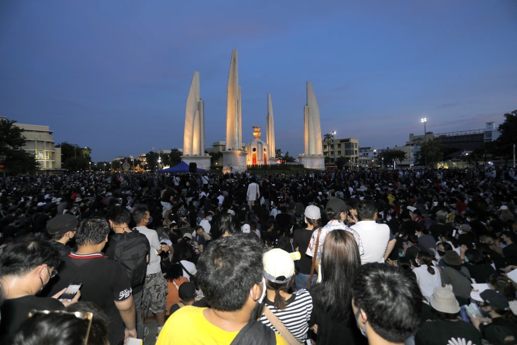Thai anti-government protesters gather front of the Democracy Monument in Bangkok, calling for a new constitution, new elections and an end to repressive laws. Photo: AP