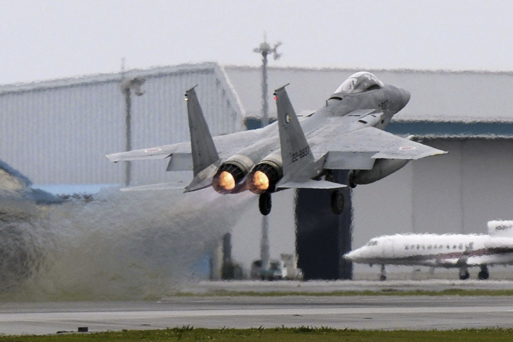 A Japanese F-15 fighter is scrambled from its base in Naha, Okinawa. Photo: Kyodo