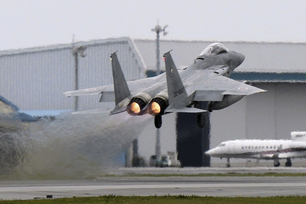 A Japanese F-15 fighter is scrambled from its base in Naha, Okinawa. Photo: Kyodo