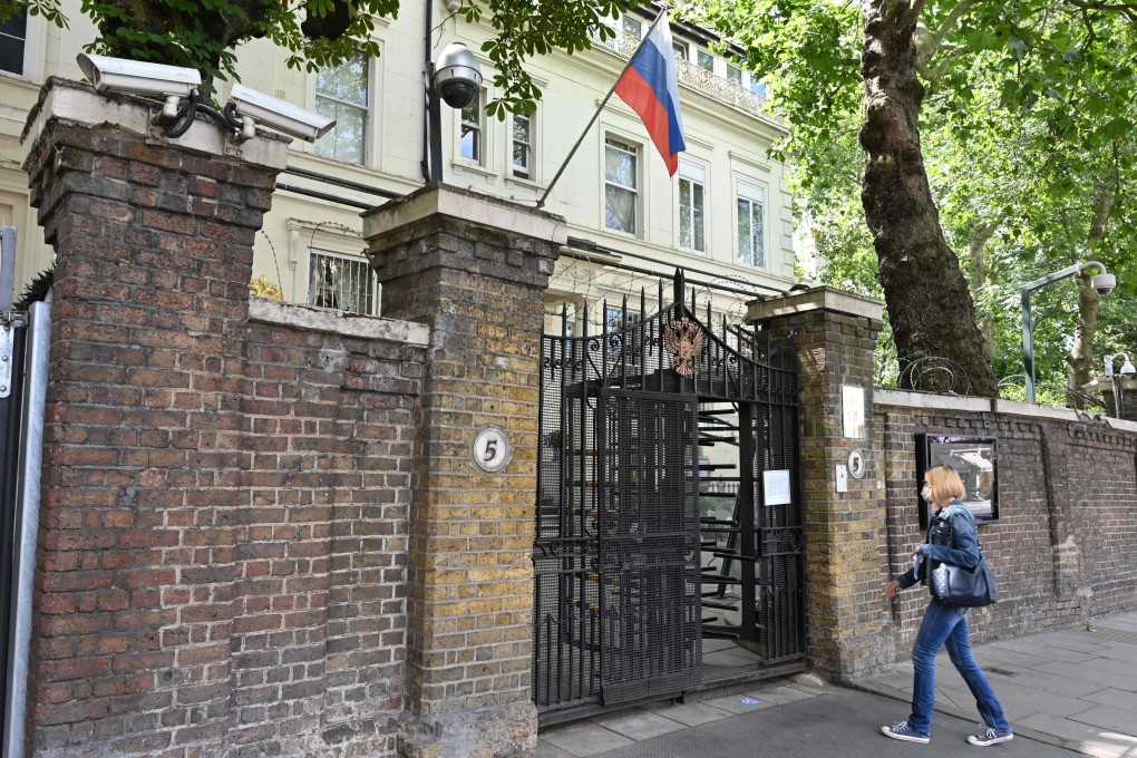 A woman enters the Russian consulate in London on July 21, after British MPs released a long-delayed report on Russian interference in British politics. Photo: AFP
