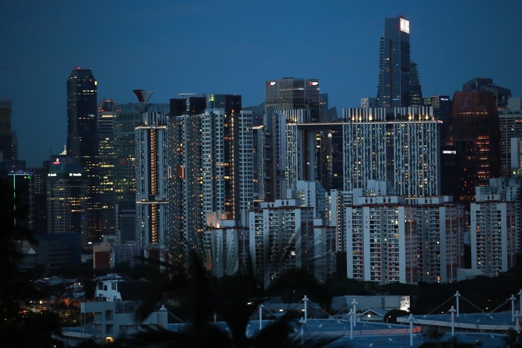 A general view of residential and commercial buildings in the evening in Singapore. Photo: EPA