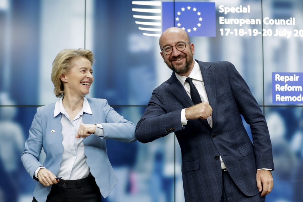 European Commission President Ursula von der Leyen and European Council President Charles Michel bump elbows after addressing a media conference at an EU summit in Brussels, on July 21. Weary EU leaders finally clinched an unprecedented budget and coronavirus recovery fund after four days and as many nights of wrangling in one of their longest summits ever. Photo: AP