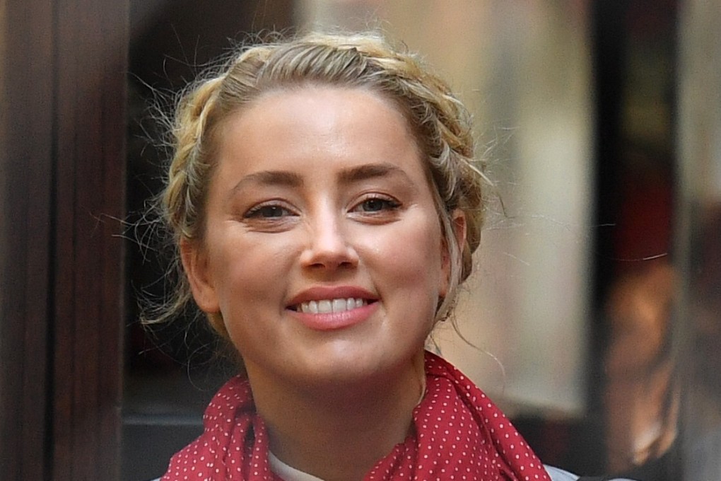 US actress Amber Heard arrives to give evidence at the libel trial by her former husband US actor Johnny Depp. She denied having affairs during their marriage. Photo: AFP