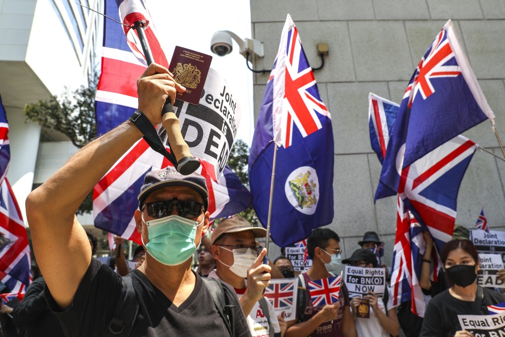A protester holds up a BN(O) passport during a rally in Hong Kong in October. The British home secretary said BN(O) citizens in the city were “in a unique position”. Photo: Nora Tam