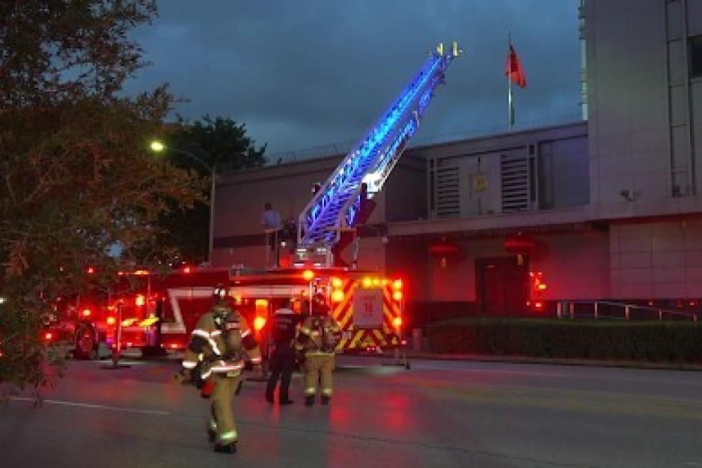 Fire crews tackle a fire at the Chinese consulate in Houston. Photo: Twitter
