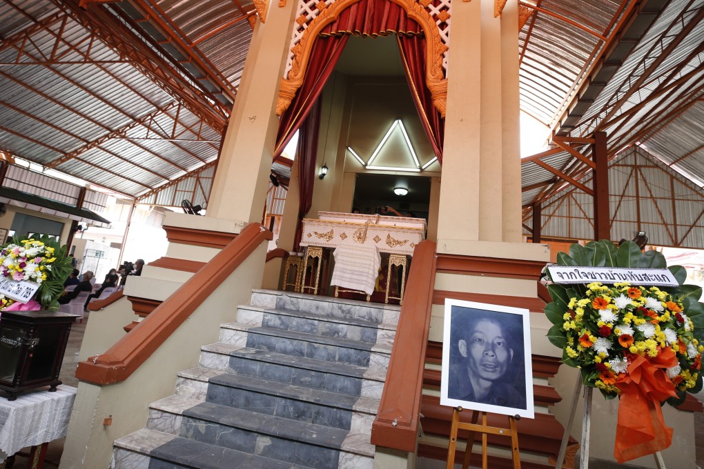 A picture of late Thai serial killer Si Quey on display in front of his coffin ahead of his cremation in Nonthaburi province, which was held over 60 years after his execution. Photo: EPA-EFE