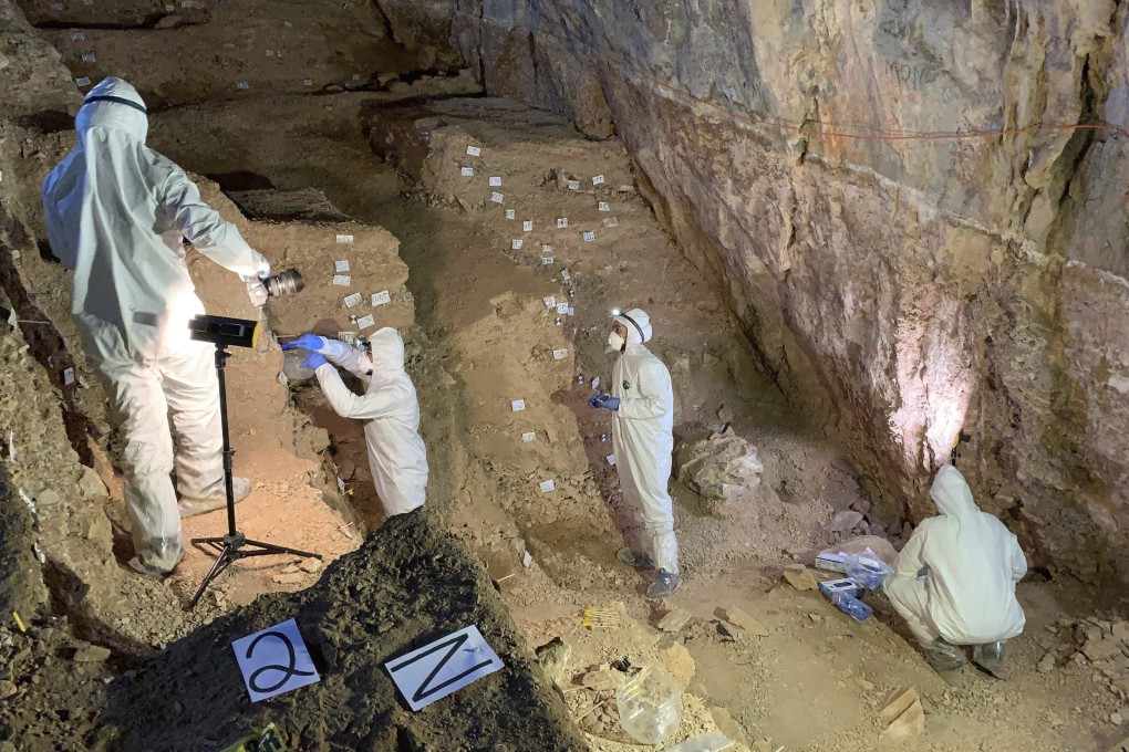 Researchers take samples from different cultural layers in a cave in Zacatecas, central Mexico. Photo: Mads Thomsen via AP