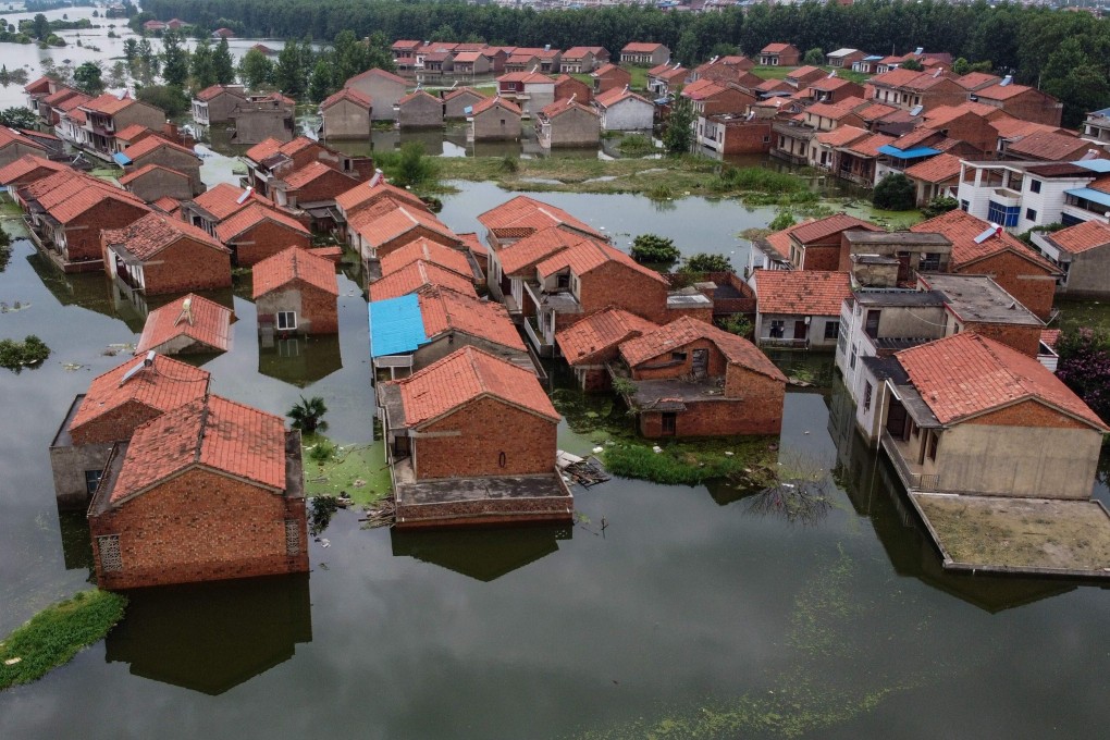 Houses in Jiangxi were inundated after the Yangtze River overflowed earlier this month. Photo: AFP