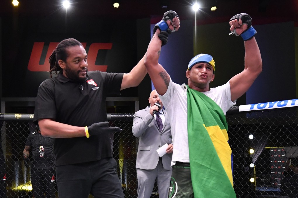 Gilbert Burns reacts after his victory over Tyron Woodley in their welterweight fight during UFC Fight Night. Photos: Jeff Bottari/Zuffa LLC