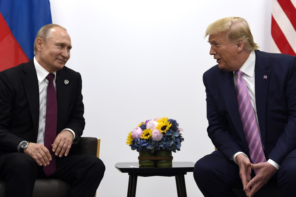 US President Donald Trump (right) meets Russian President Vladimir Putin on the sidelines of the G20 summit in Osaka, Japan in June 2019. Photo: AP