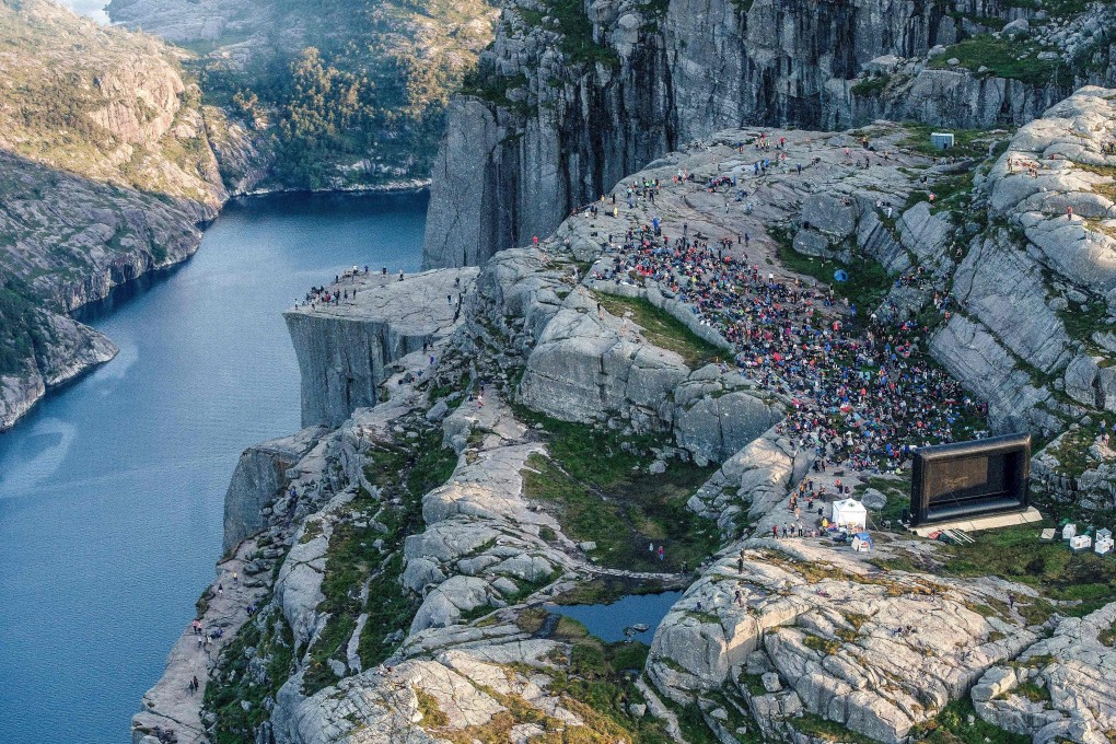 People gather in the mountains near Norway’s Preikestolen to see the filming of the movie ‘Mission: Impossible - Fallout’ in 2018. Photo: AFP