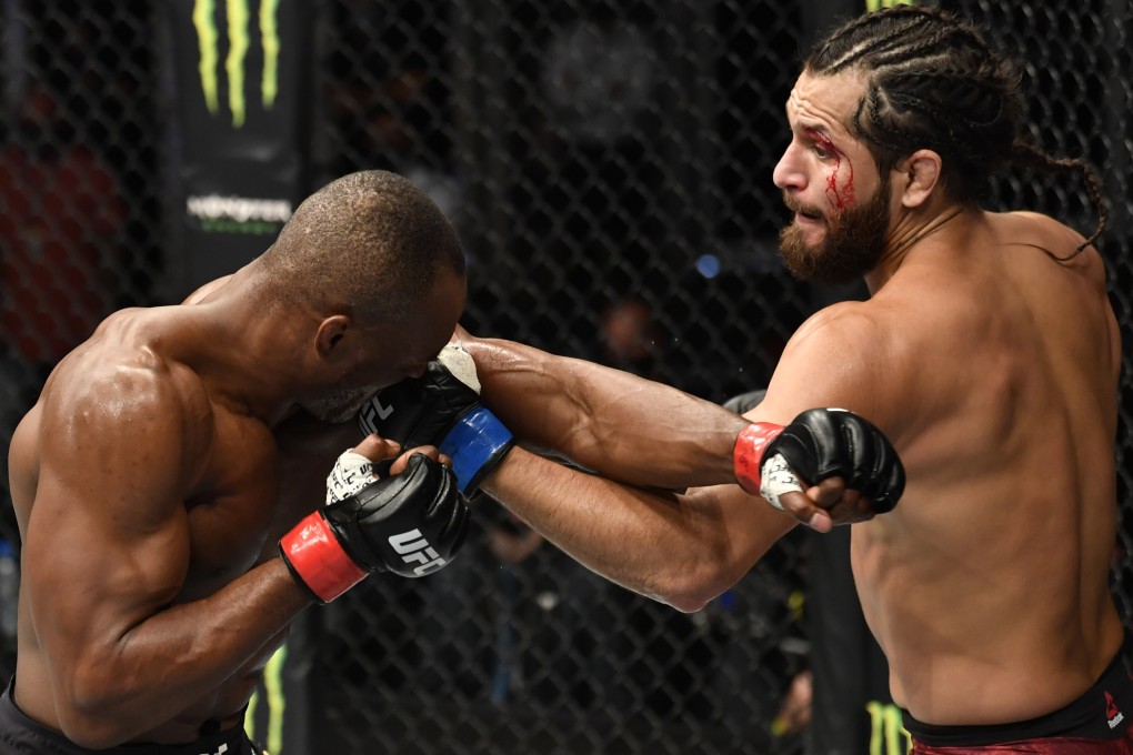 Jorge Masvidal punches Kamaru Usman in their welterweight championship fight during UFC 251 on UFC Fight Island in Abu Dhabi. Photo: Jeff Bottari/Zuffa LLC
