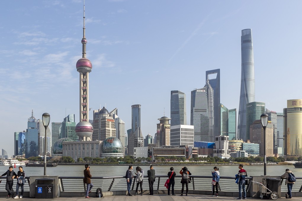Shanghai should accelerate its development as a global financial centre, a report says. Photo: Xinhua