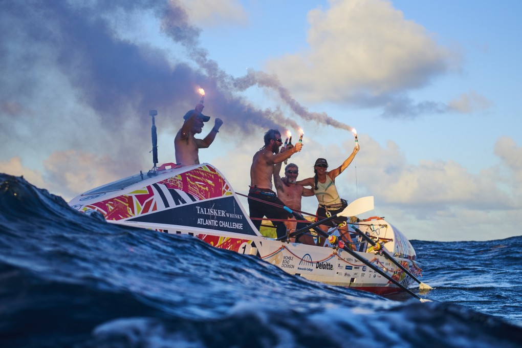 Members of the Northwest Passage 2021 team celebrating crossing the Atlantic in 2018-19. Photo: Ben Duffy