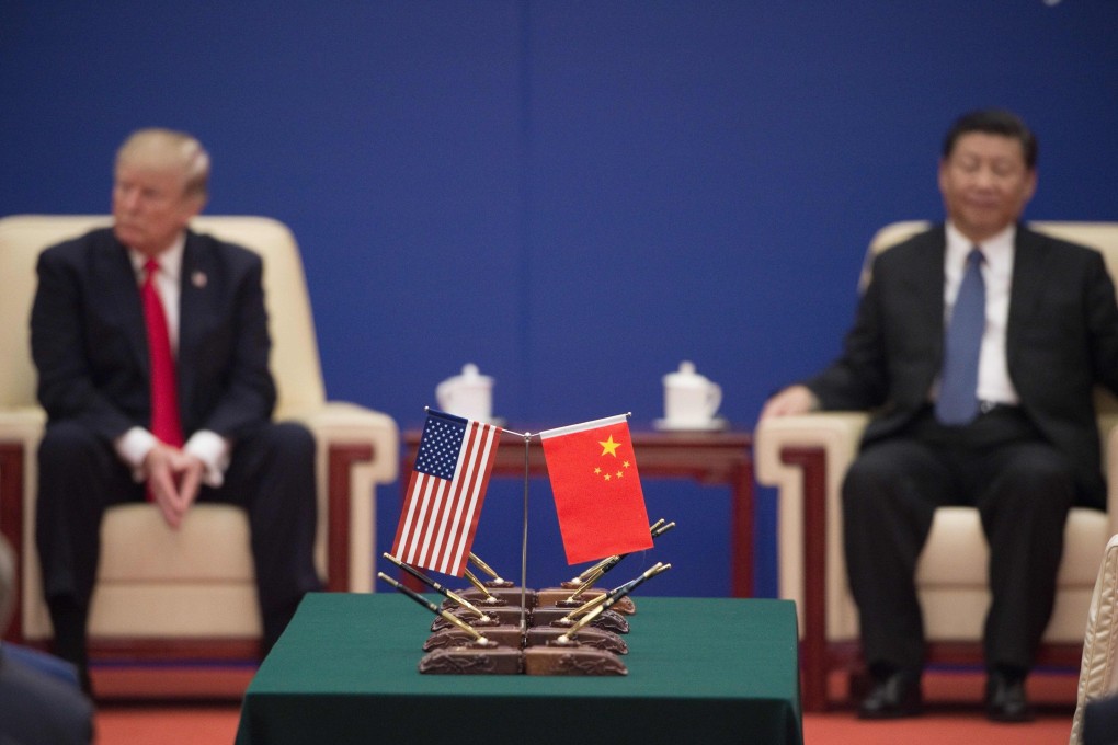 US President Donald Trump (left) and Chinese President Xi Jinping attend a business leaders event inside the Great Hall of the People in Beijing on November 9, 2017. Relations between the two countries have deteriorated dramatically since then. Photo: AFP