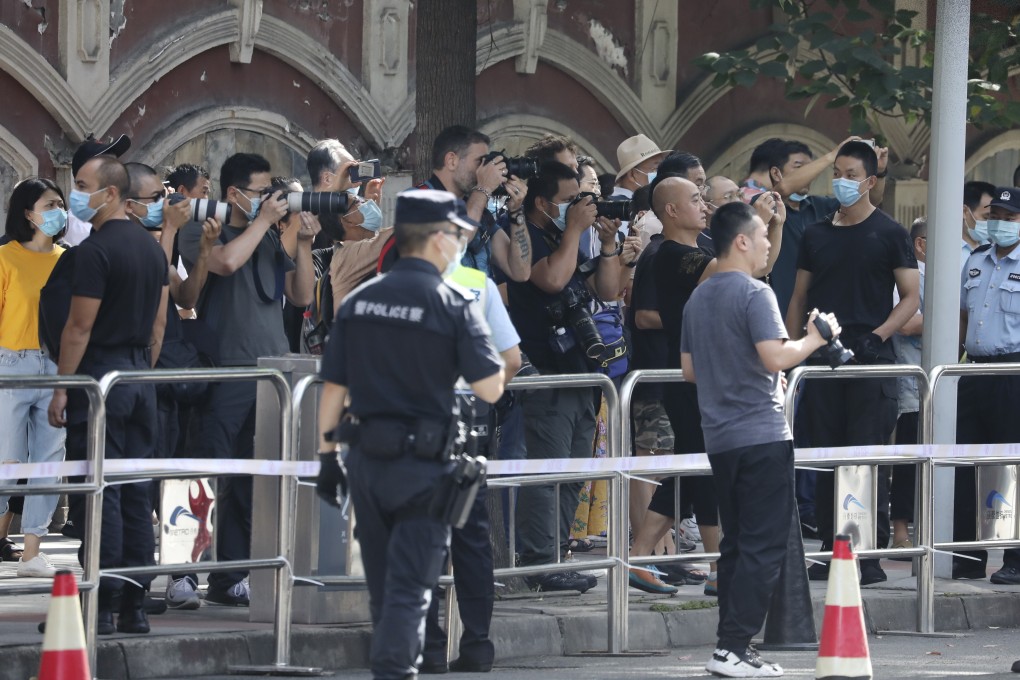 Crowds continued to gather outside the consulate in Chengdu. Photo: Simon Song
