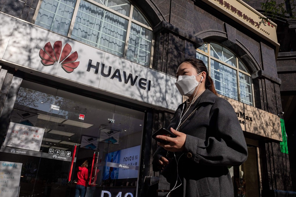 A woman wearing a face mask in Beijing on April 22 amid concerns about the Covid-19 pandemic. Photo: AFP