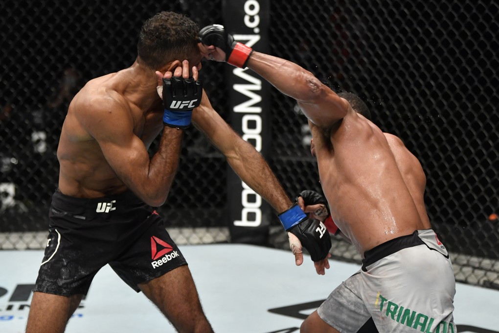 Francisco Trinaldo punches Jai Herbert in their lightweight fight during the UFC Fight Night event inside Flash Forum on UFC Fight Island. Photo: Jeff Bottari/Zuffa LLC via USA TODAY Sports