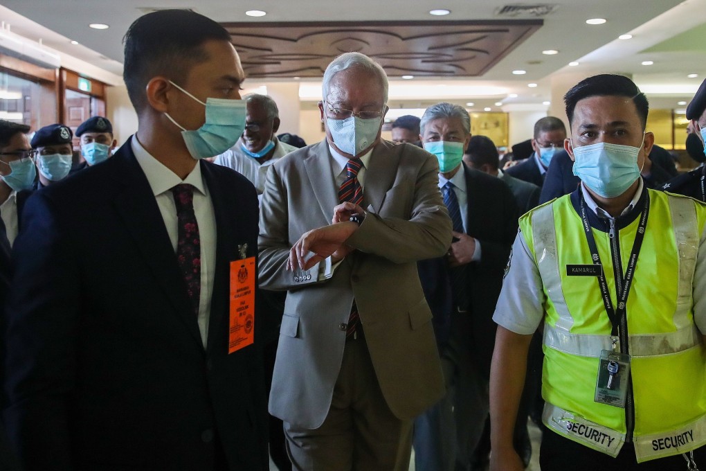 Facing time: Malaysia’s former prime minister Najib Razak arrives at the Kuala Lumpur High Court ahead of the guilty verdict in his first 1MDB trial. Photo: AFP