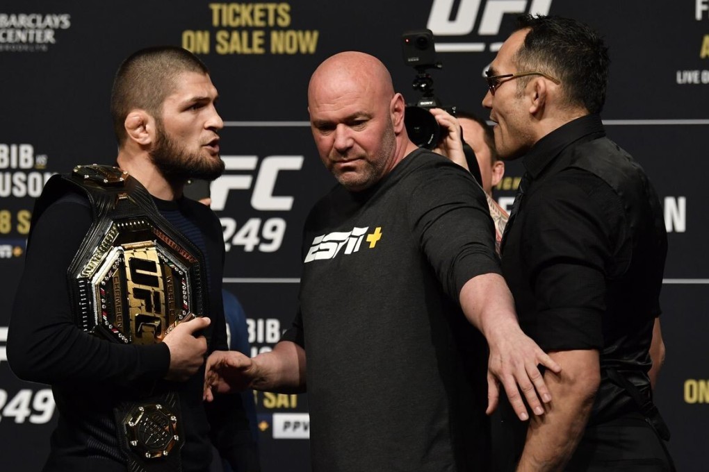 Dana White separates Khabib Nurmgomedov (left) and Tony Ferguson during the UFC 249 press conference at T-Mobile Arena in Las Vegas. Photo” Jeff Bottari/Zuffa LLC