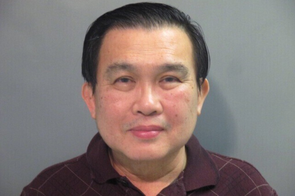 Suspended university professor Simon Ang was indicted in Fayetteville, Arkansas, on Tuesday. Photo: Washington County Detention Centre via AP