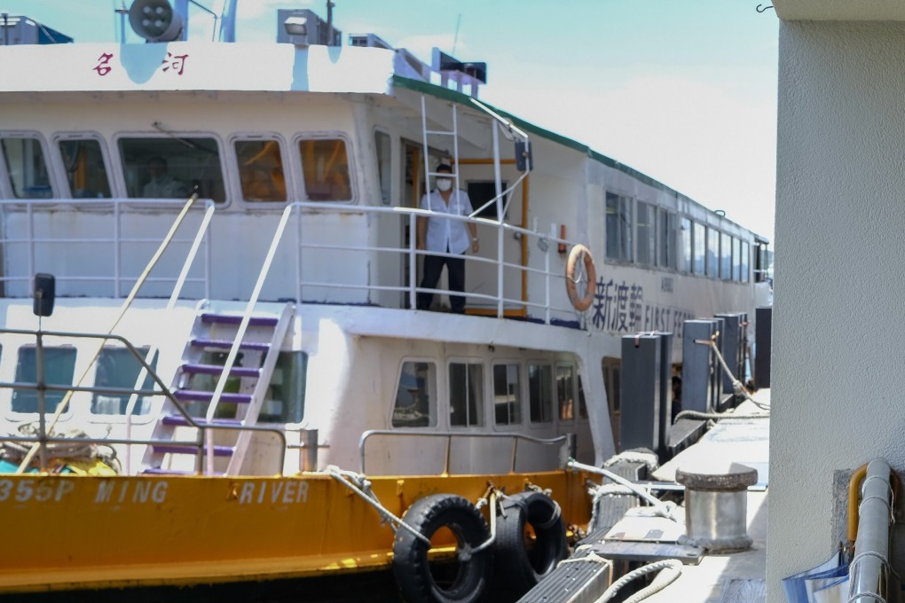 The coxswain looks out from the Ming River inter-islands ferry, which shuttles between Hong Kong’s outlying Cheung Chau and Peng Chau. Photo: James Wendlinger