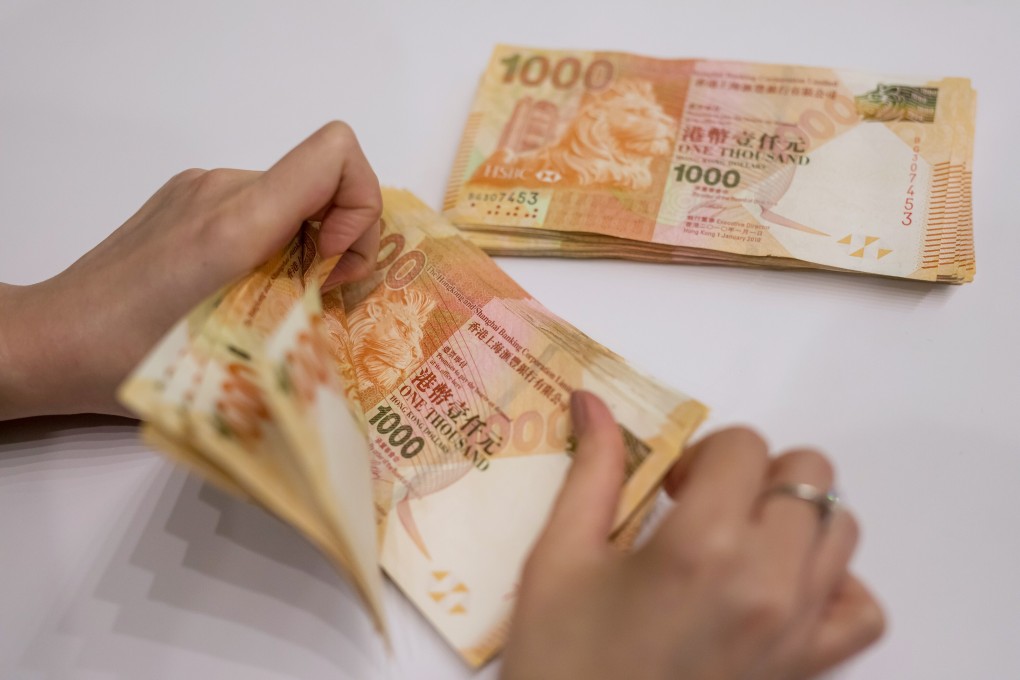 The amount of money held in accounts rose by HK$225.84 billion (US$29.14 billion) to break through the HK$14 trillion mark at the end of June. Photo: Bloomberg