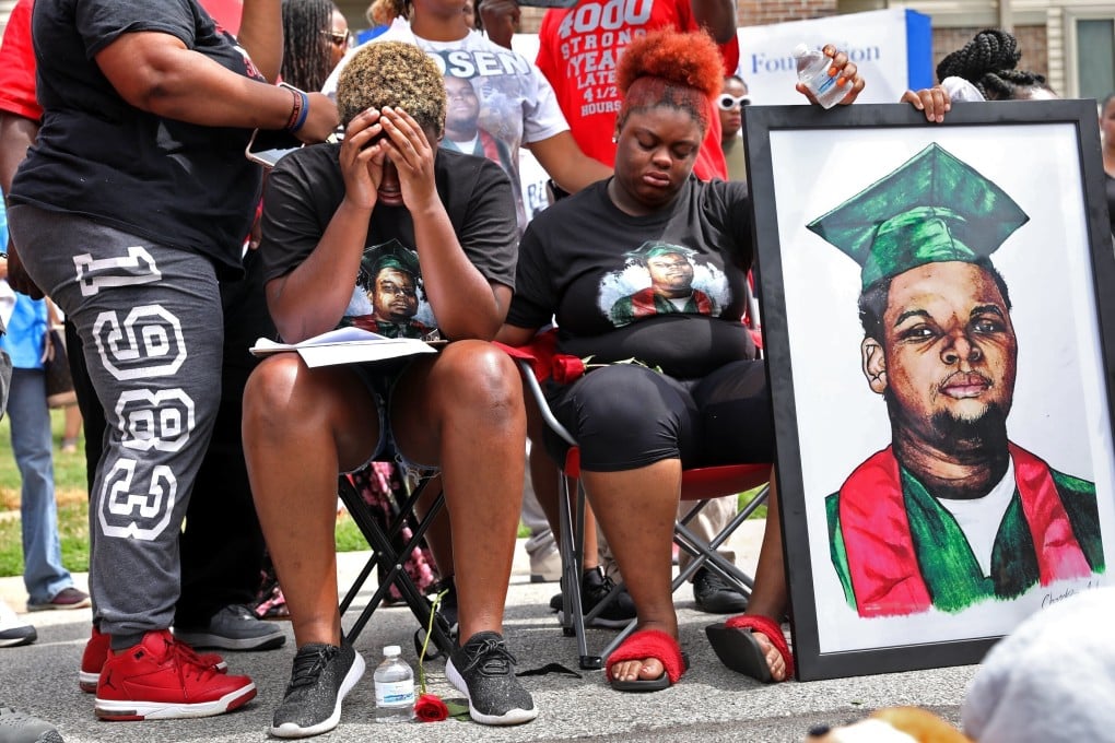 Trinetta Brown (centre left) and Triniya Brown attend a memorial service for their brother, Michael Brown, in Ferguson, Missouri, in August 2018. Photo: St Louis Post-Dispatch via AP