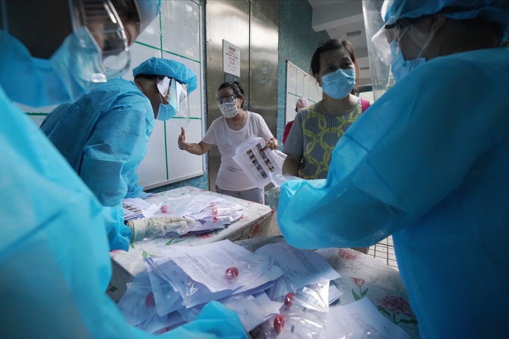 Residents receive Covid-19 testing kits at the Tsz Ching Estate in Tsz Wan Shan on July 28. It is easy to understand why people might feel anxious these days amid lingering concerns over the pandemic and Hong Kong’s precarious position in the US-China rivalry. Photo: Felix Wong