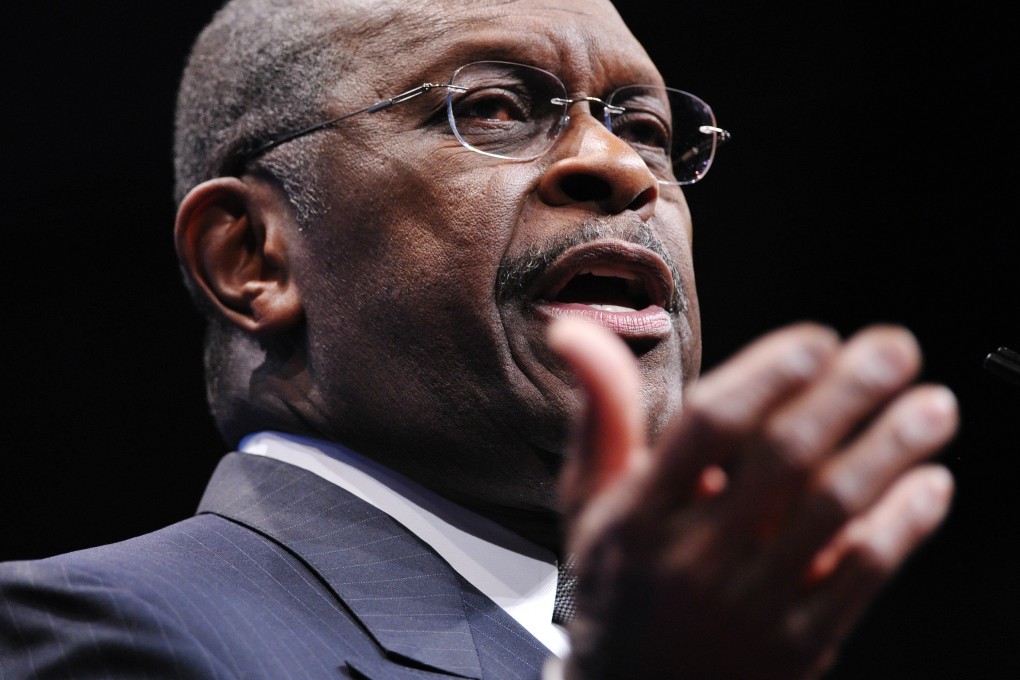 Former Republican presidential candidate Herman Cain speaks during an event at a hotel in Washington in February 2012. Photo: AFP