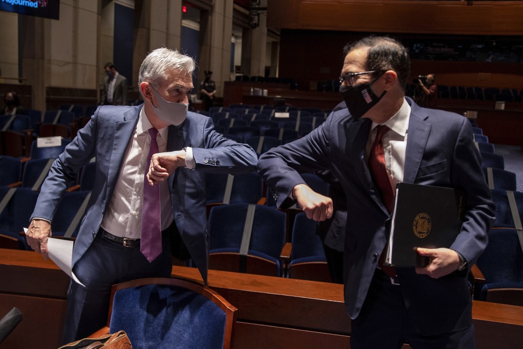 Federal Reserve chairman Jerome Powell greets Treasury Secretary Steven Mnuchin after testifying on the Fed’s pandemic response on June 30. The Fed has added an unprecedented US$3 trillion to its balance sheet so far this year. Photo: EPA-EFE