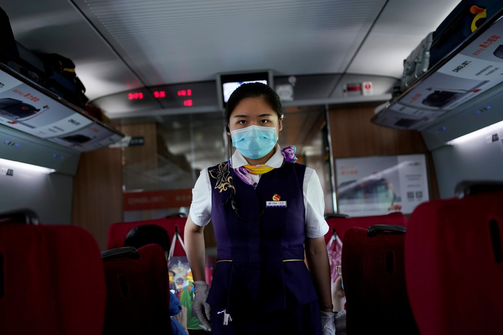 A crew member at work a high-speed train at Wuhan Railway Station in May 17. Photo: Reuters