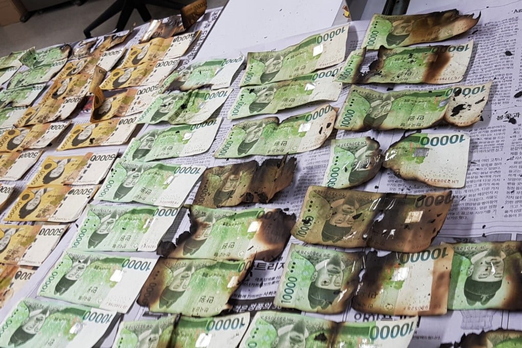 South Korean banknotes damaged after being heated up in a microwave. Photo: Bank of Korea via AP