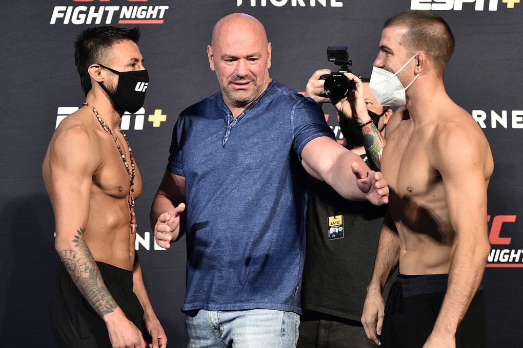 Dana White separates Chris Gutierrez and Cody Durden during the UFC Fight Night weigh-in at UFC APEX on July 31. Photo: Chris Unger/Zuffa LLC via Getty Images