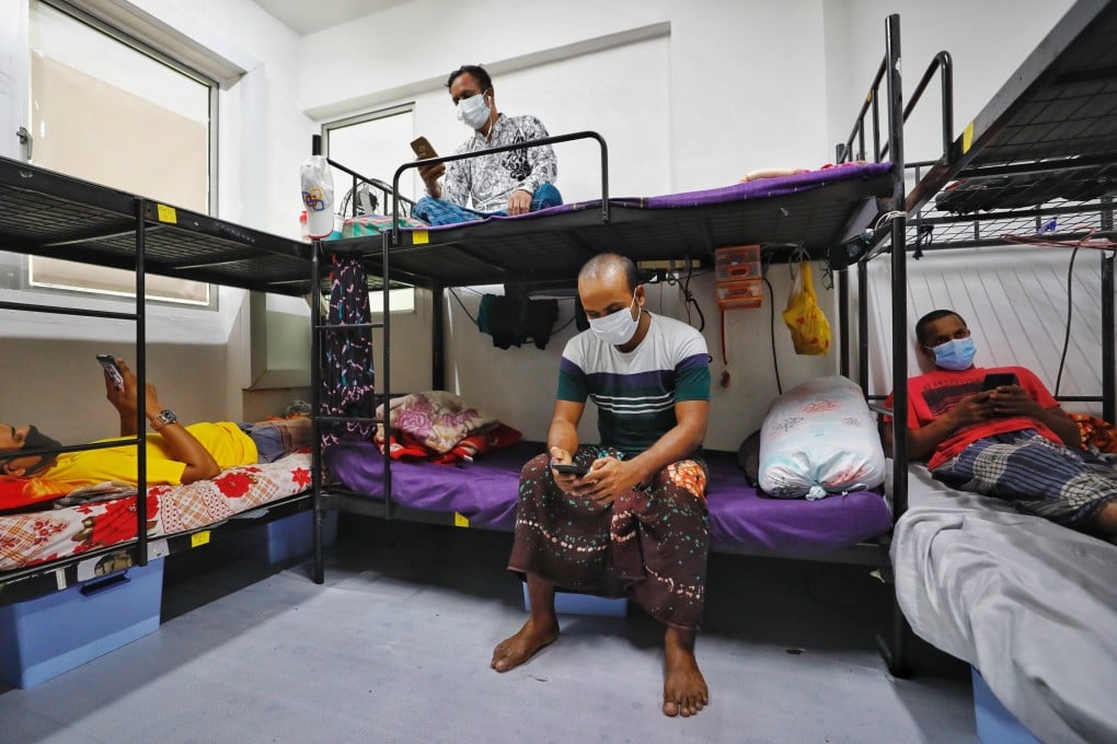 Tens of thousands of foreign workers in Singapore have been put under quarantine amid the pandemic, and returning to their home countries – including China – is simply not an option. Photo: EPA