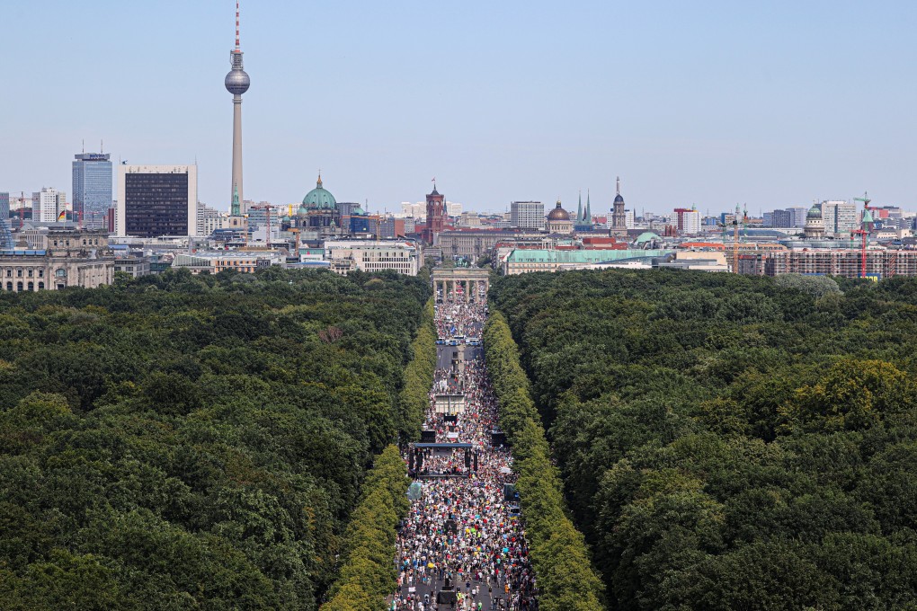 Thousands take part in a protest near Berlin’s Brandenburg Gate against the government's Covid-19 restrictions. Photo: Reuters