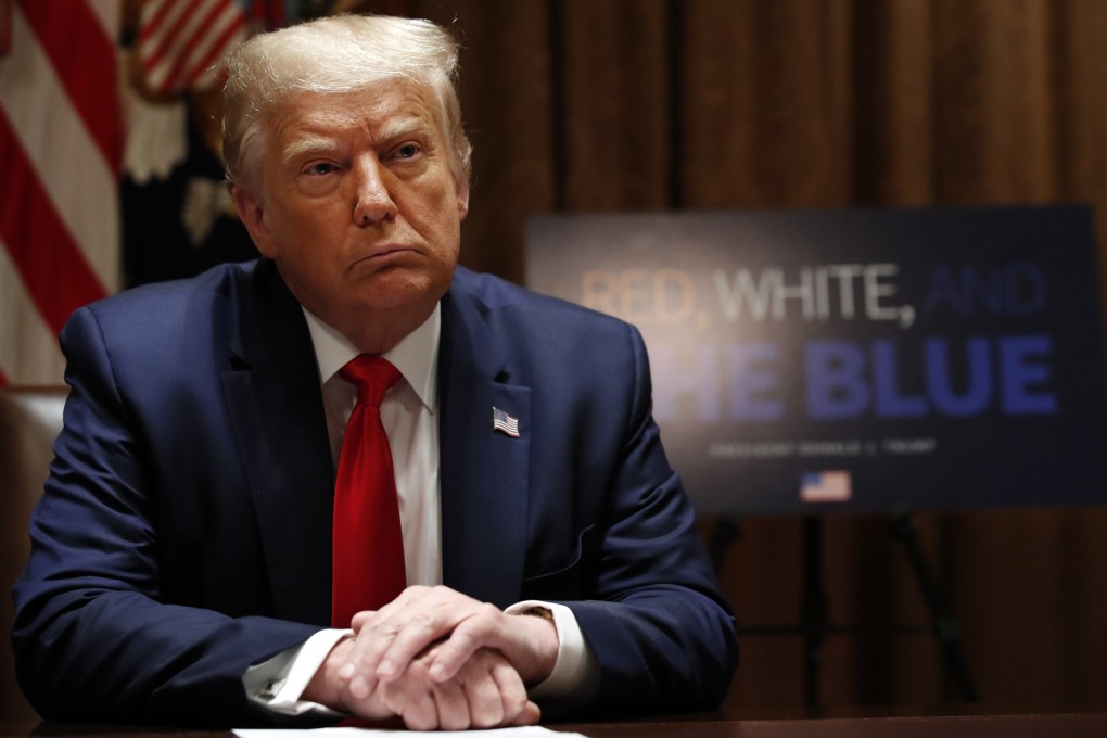 US President Donald Trump listens during at the White House on Friday. Photo: AP