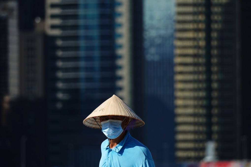 An elderly man in a mask at the West Kowloon waterfront. Hong Kong is struggling with a third wave of coronavirus infections. Photo: Sam Tsang