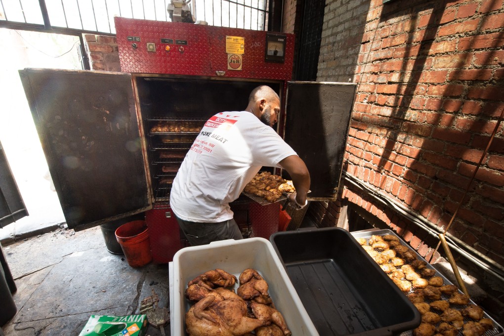 A pitmaster at work. Photo: Getty Images