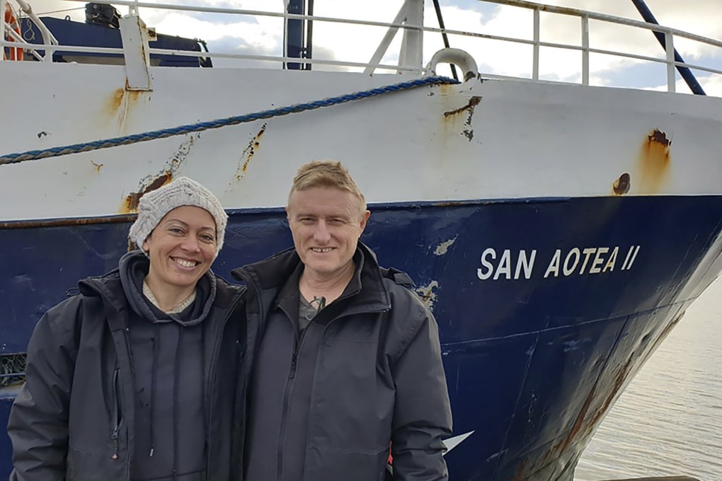 New Zealand couple Neville and Feeonaa Clifton pose next to the San Aotea II fishing boat in the Falkland Islands. Photo: Feeonaa/Neville Clifton via AP