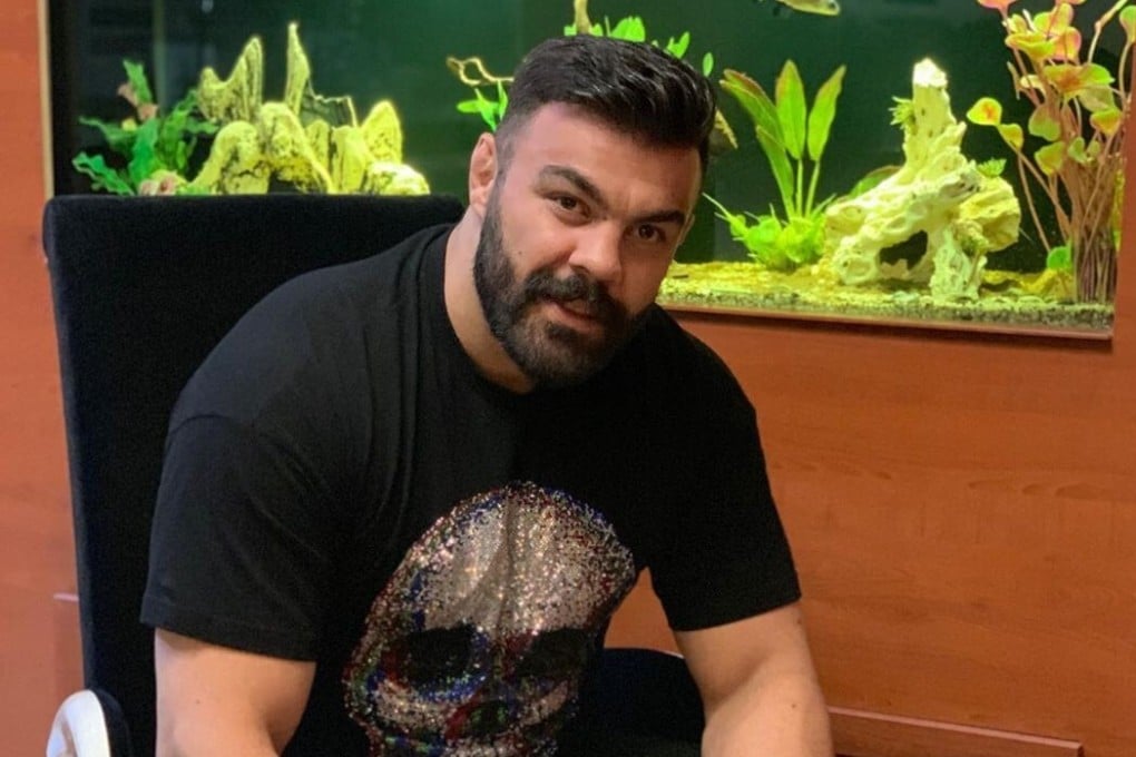 Amir Aliakbari signs a contract with Dominance MMA Management. Photo: Instagram/@amiraliakbari60