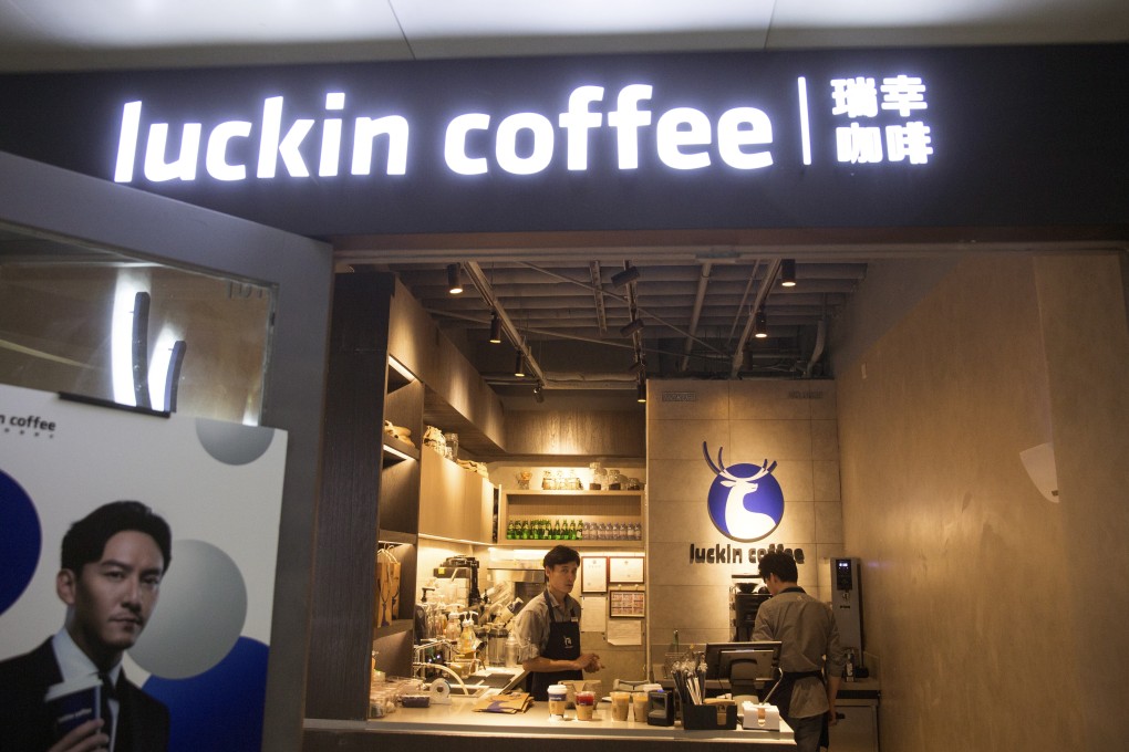 Workers seen brewing coffee at an outlet in Beijing, China in May 2018. The accounting scandal has erased US$11 billion in the firm’s market value ahead of its delisting from Nasdaq. Photo: EPA-EFE