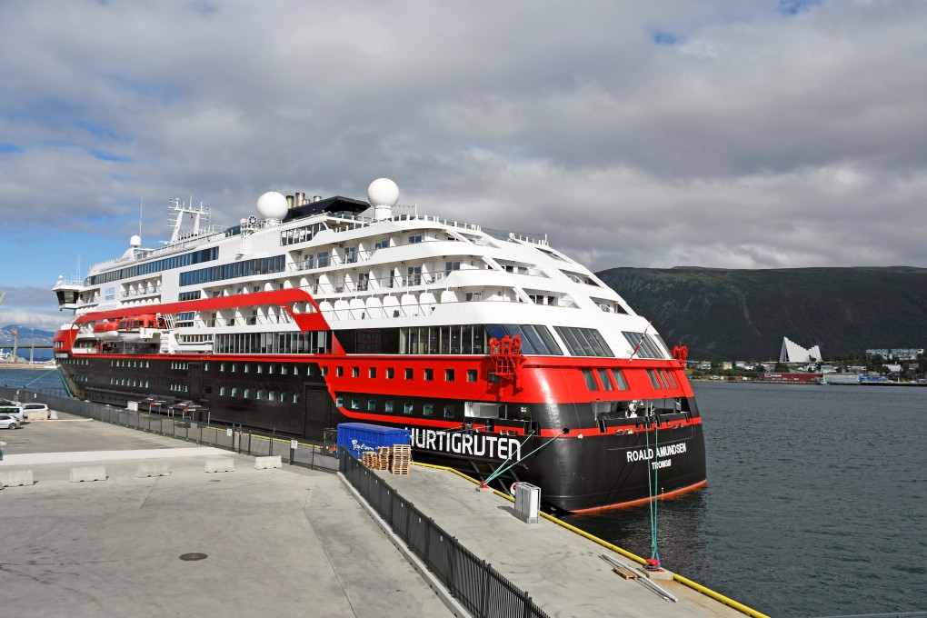 The MS Roald Amundsen ship, operated by Norway's Hurtigruten line, is seen at a port in Tromso after crew members and passengers were diagnosed with Covid-19. Photo: Reuters