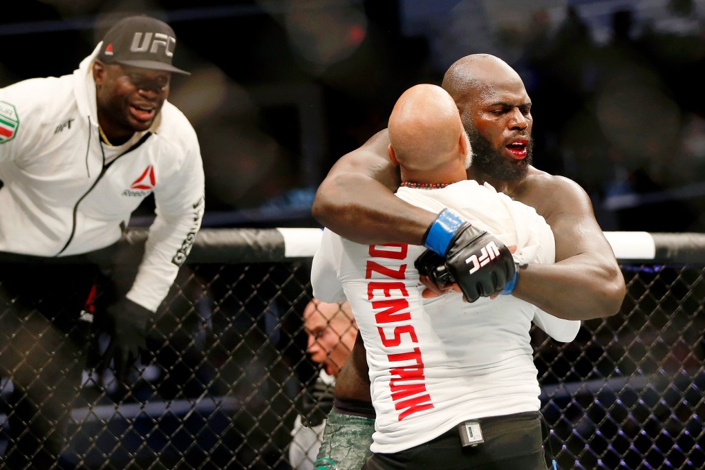 Jairzinho Rozenstruik celebrates with his coaches after his win against Alistair Overeem during UFC Fight Night at Capital One Arena. Photo: Amber Searls-USA Today Sports