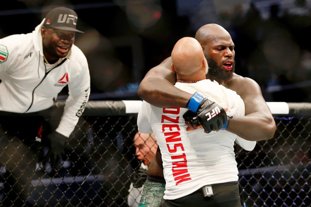 Jairzinho Rozenstruik celebrates with his coaches after his win against Alistair Overeem during UFC Fight Night at Capital One Arena. Photo: Amber Searls-USA Today Sports