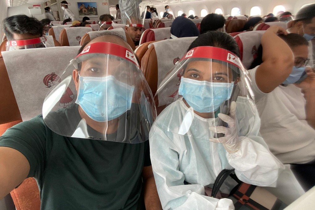 Rajiv Sahay and wife Meenakshi Sahay arrived back in Hong Kong on Tuesday after six months in India. Photo: Handout
