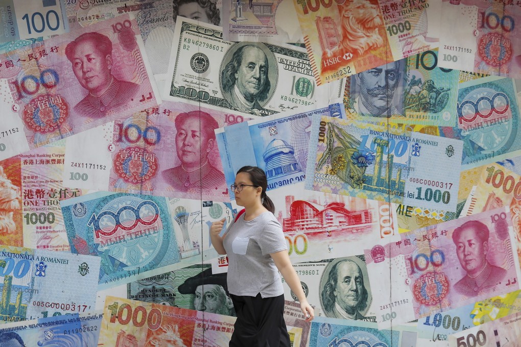 China’s State Administration of Foreign Exchange has waived interbank transaction fees for a basket of 12 currencies, not including those of countries with whom China has tenuous relations. Photo: AP