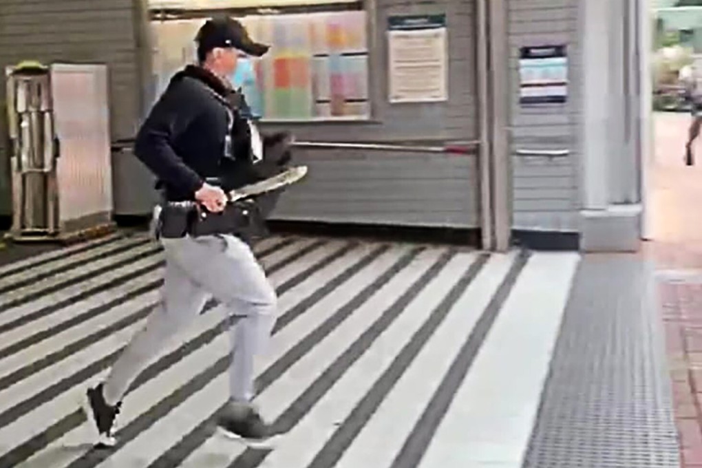 One of the two robbers runs from the station after the attack. Photo: Facebook