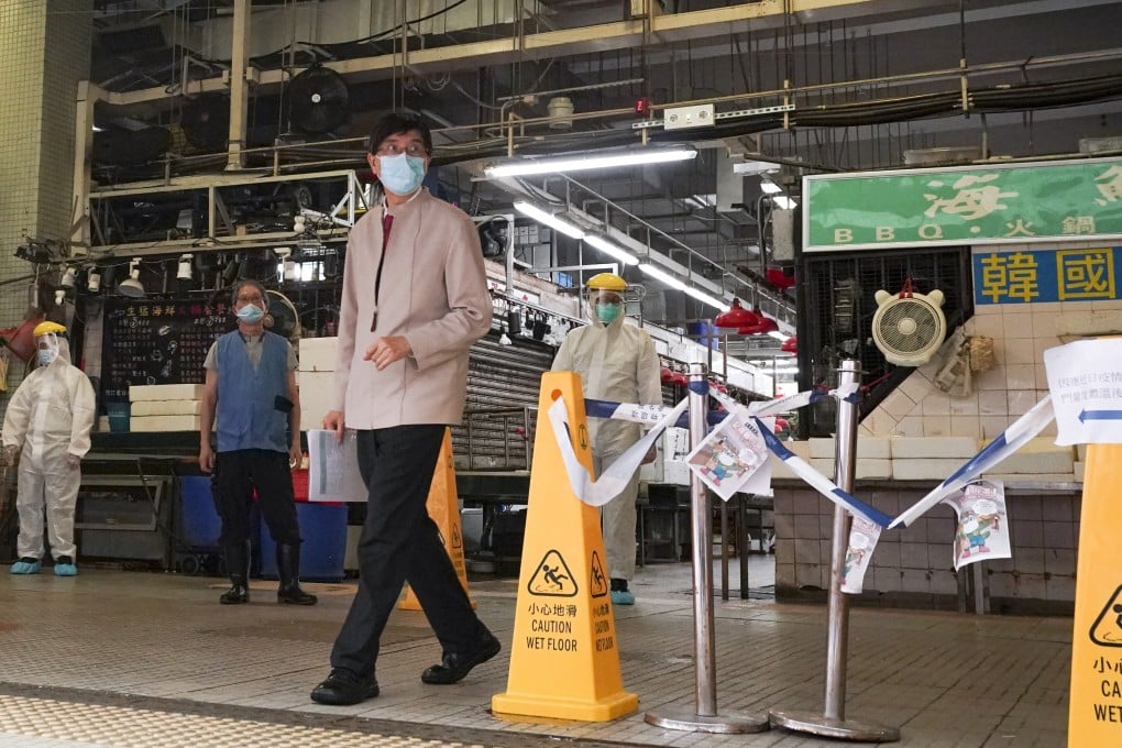 University of Hong Kong microbiologist Professor Yuen Kwok-yung conducts an inspection of the Hung Hom Market where cases of Covid-19 were reported. Photo: Felix Wong