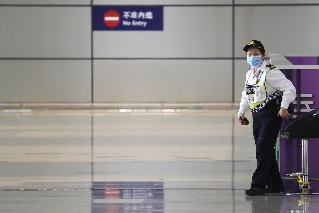 A lone security guard on duty at the Hong Kong side of the mega bridge connecting to Macau and Zhuhai in April. Photo: Edmond So